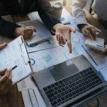 Team,Of,Business,Investment,Consultant,Analyzing,Company,Annual,Financial,Report Team,Of,Business,Investment,Consultant,Analyzing,Company,Annual,Financial,Report