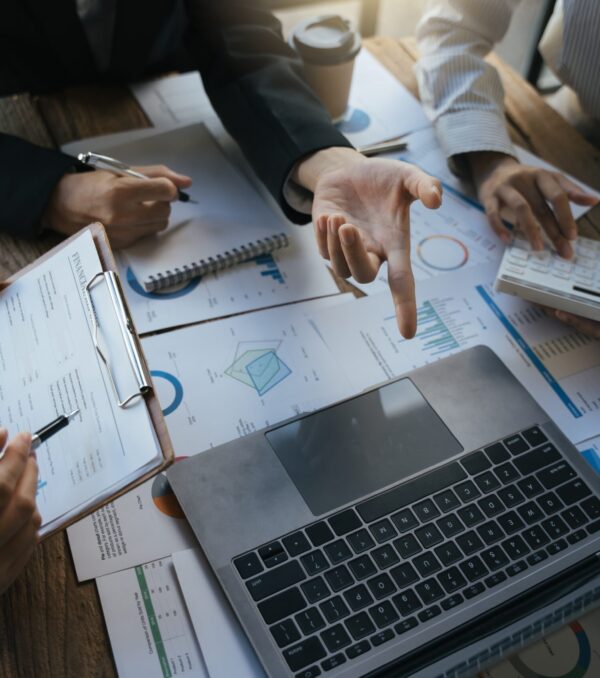 Team,Of,Business,Investment,Consultant,Analyzing,Company,Annual,Financial,Report